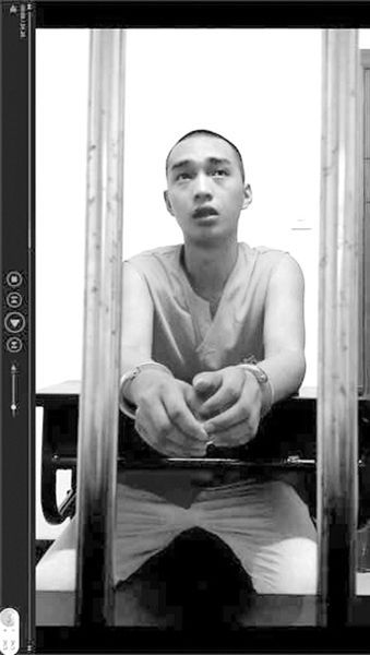 在看守所里的陳明燦。視頻截圖