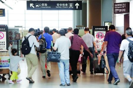 近期乘飛機應留足更多的時間以免誤機。/晨報記者 殷立勤