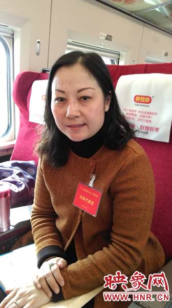 作為全國人大代表，王馨最關(guān)心的就是農(nóng)民工權(quán)益的保護(hù)問題。