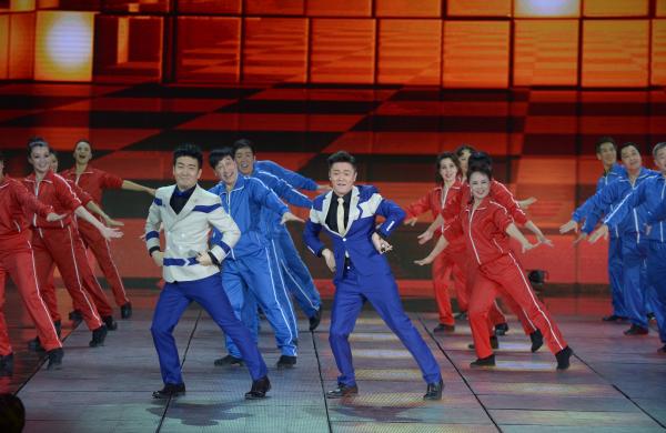 《小蘋果》、《最炫民族風》等廣場舞曲將會有全國統(tǒng)一、編排科學、帶給人正能量的全新動作。 CFP 資料