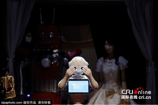日本首個機(jī)器人婚禮于東京舉行 日本首個機(jī)器人婚禮于東京舉行