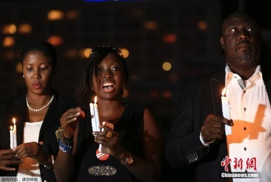 　資料圖：當地時間2014年8月26日，尼日利亞阿布賈，民眾舉行“帶回我們的女孩”活動為埃博拉病毒感